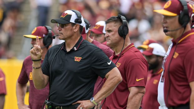 Washington Commanders head coach Ron Rivera looks onto the field dung the first half against the Arizona Cardinals at FedExField.